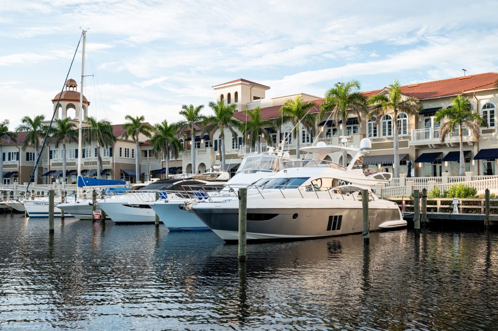 Boats docked outside Marina Village at Tarpon Point Marina in Cape Coral.